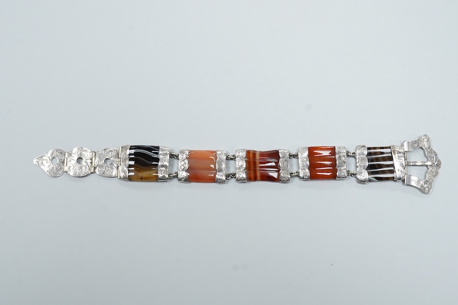 A Victorian Scottish engraved white metal and banded agate set bracelet, with buckle clasp, overall length 21.8cm.